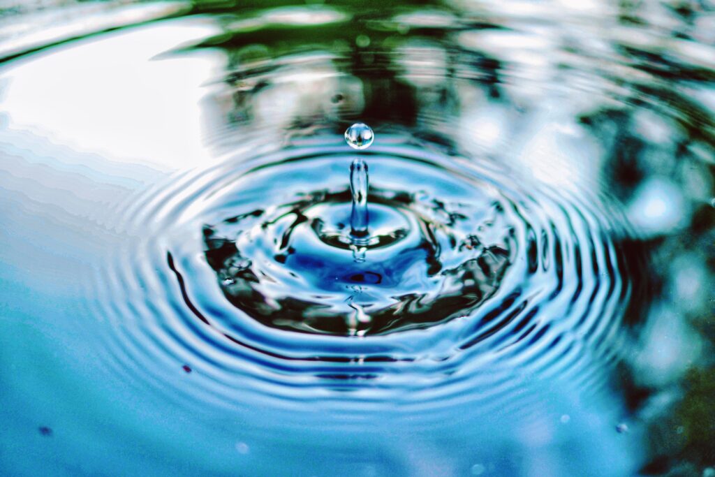 Water drop on lake.